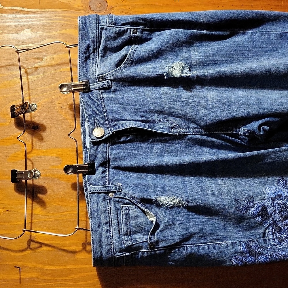 Distressed embroidered skinny jean